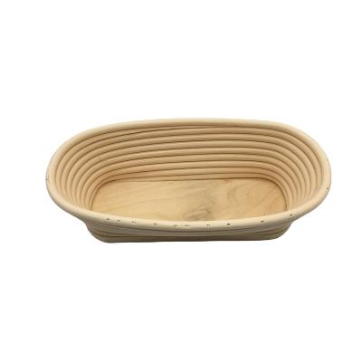 China Disposable Wholesale Goods Handcrafted Oval Rattan Proving Basket with Wooden Bottom for sale