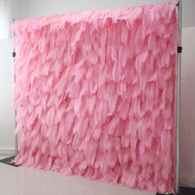 China Wedding decorative black flower floral wall artificial decorative wall feather panel roll up pink white feather wall backdrop for wedding party for sale