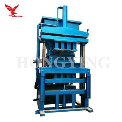 China Hydraulic Semi Automatic Brick Machine Interlocking Clay Brick Machine for sale