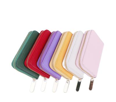 China Mini Pu Leather Rfid Women's Small Wallet Restructuring Credit Clip Waterproof High Quality Leather Wallet Shorts for sale