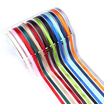 China Custom Wholesale 1.2CM Recyled Double Face Printed Polyester Ribbon Face Polyester Satin Ribbon for sale