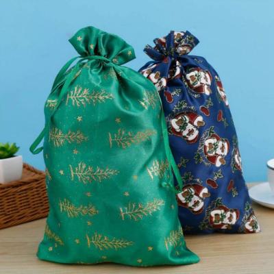 China Fashionable Christmas Gift Bag Santa Claus Printed Satin Christmas Drawstring Gift Bags Santa Wrapping Bag for sale