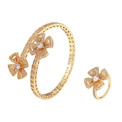 China CLASSIC Fashion New Design 18k Gold Plated Bracelet and Ring Sun Flower Jewelery Four Leaf Clover Bracelets For Women Jewelry Set for sale