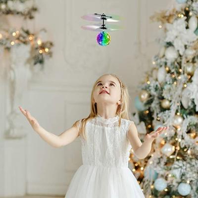 China Infrared Sensor Flight Ball Toys Rechargeable Ball Drone Light Up RC Toy With Remote Controller For Kids Boys Girls Gifts for sale