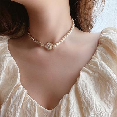 China Fashion Trendy Korean Gold Camellia Flower Pearl Jewelry Necklaces Clavicle Chain Pearl Necklace Pastoral Necklace For Women for sale