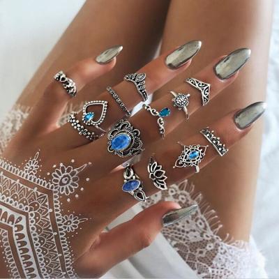 China Fashion Rings Set 13 Pcs Gemstone Ring Beautiful Ethnic Openwork Lotus Cheap Inlaid Crown With Diamond Heart Elephant Women Rings Set for sale