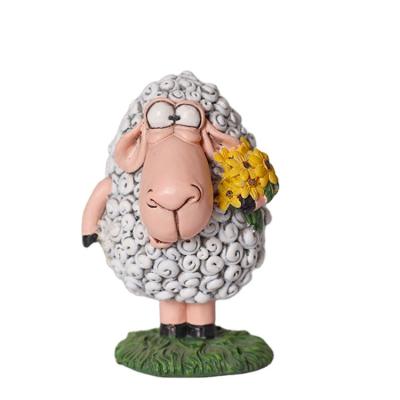 China Europe Custom Resin Crafts Ornament Small Gift Resin Figurines Animal Sheep With Flowers For Home Trinkets for sale