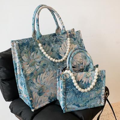 China Designer Graffiti Casual Ladies Tote Hand Bags Canvas Monet Water Lily Ins Fashion Flower Painting Handbags New for sale