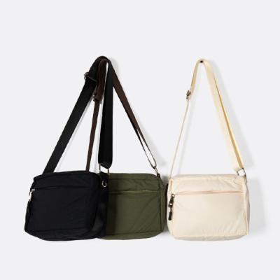 China 2021 New Canvas Travel Multifunctional Lightweight Women Cross - Body Messenger Bag for sale