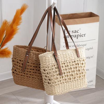 China Wholesale Bulk Straw Bag Portable Logo Beach Straw Tote Bag With Portable PU Handle for sale