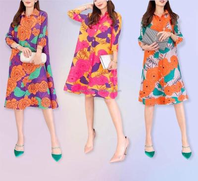 China Anti-Static Plus Size Women Lady Elegant Pleated African Thailand Mother Shirt Dresses Button Through Long Sleeve Floral Print Dresses for sale