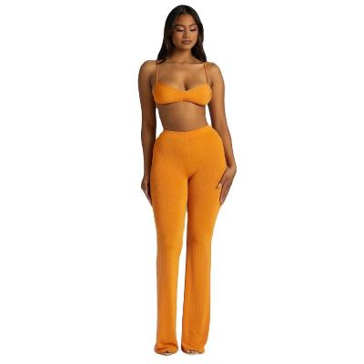 China Washable Women Crop Top And Bodycon Rocket Pants Two Piece Criss Cross Backless Set for sale