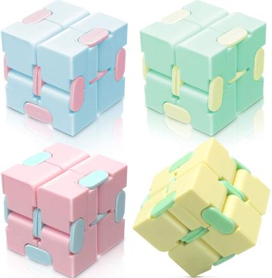 China Anxiety Relief Macaron Color Fidget Toy Infinity Cube Finger Cube Toy Mini Fidget Cube Toy for Kids and Adult for sale