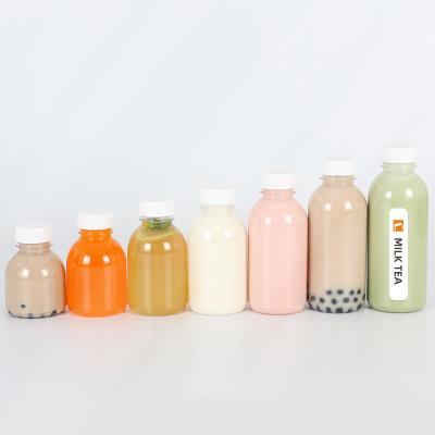 China Wholesale Clear Good Quality Juice Drink Bottle PET 300ml 350ml Cold Brew Coffee Plastic Bottles Square Juice Bottle for sale