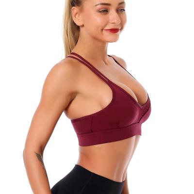 China Beautiful Gather Back Shockproof Women's Sports News Antibacterial Antibacterial Cross Back Yoga Fitness Running Bra for sale