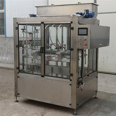 China Food New Products 1000W Hot Liquid Edible Essential Oil Filling Machine for sale