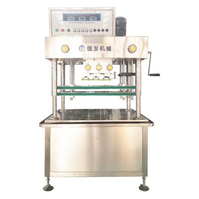 China Automatic Food Capsule Oil Sealing Machine Plastic Pail Bucket Bottle Oil Capping Machine for sale