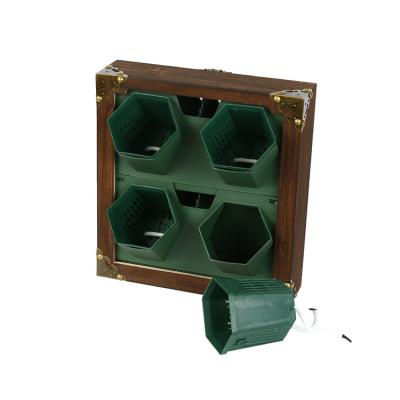 China 4 Holes Modern Green Wall Mounted Planting Vertical Hydroponic Flower Pot for sale