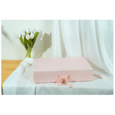 China Magnetic foldable package cajas de carton wedding clothes paper cardboard closure materials reused bundling packing luxury gift box with ribbon for sale