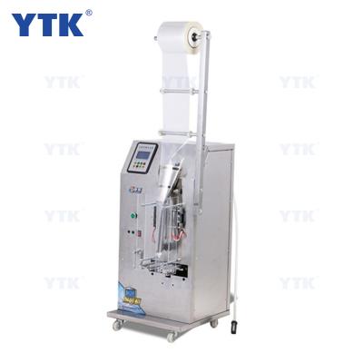 China Food YTK 0-200ml Automatic Measured Food Grade Liquid Dispenser Liquid Packing Machine Price for sale