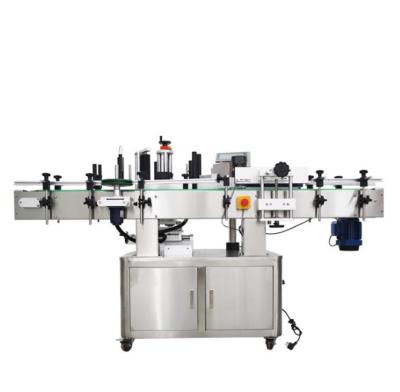 China Food high speed vertical self adhesive labeling machine for round bottles YTK-220/automatic labeling machine for sale