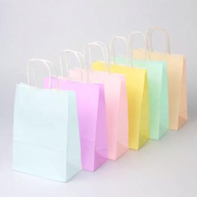 China Custom Luxury Pink Paper Clothing Bottle Wine Bag Packaging Materials Recycled Logo Shopping Bag for sale