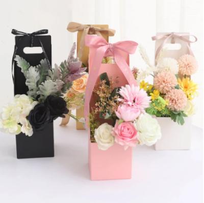 China Recycled Portable Candy Box Wedding Party Gift Florist Box Materials Packaging Paper Bag Flowers Handbags Waterproof Cardboard Boxes for sale