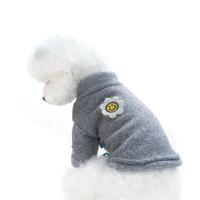 China Dogs and cats stocked in autumn and winter comfortable home clothes shear warm smiling face flower basing shirt clothing pet clothes for sale