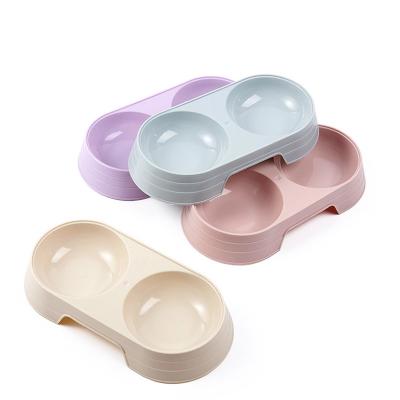 China Macaron Double Bowl Pet Kitten Dog Food Drinking Tray Stocked Plastic Feeder Cat Feeding Pet Supplies Access for sale