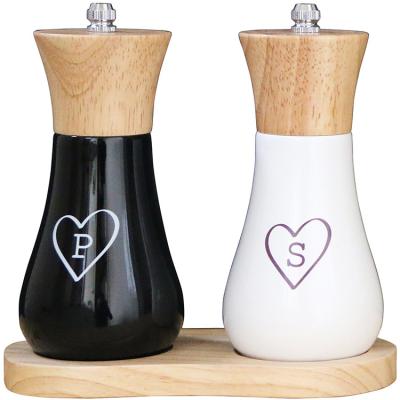 China Hot Selling Viable 2 In 1 Wooden Salt And Pepper Pot Grinder With Wood Spoon For Manual Pepper for sale