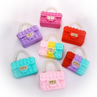 China 2022 new kids toy sling noise bubble noise pusher push up purse purse jelly handle bead viable itting bags for girls for sale