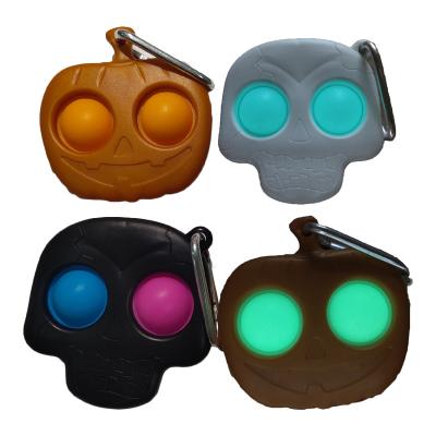 China Scary Decompression Skull Pumpkin Horror Character Glow In The Dark Mini Halloween Key Chain Neon Noise Stirring Person For Single Push Bubble Toy for sale