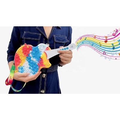 China Viable Kids Silicone Sensory Cross New Large - Body Shoulder Push Bubble Popper Guitar Buster Noise Bag For Girls, Boys for sale