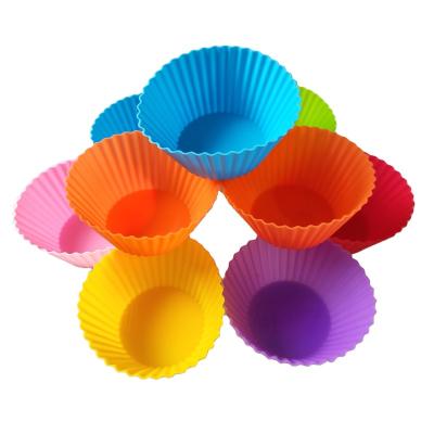 China Stocked Cupcake Holder Non-Stick Basics Reusable Silicone Muffin Liners Baking Cups for sale