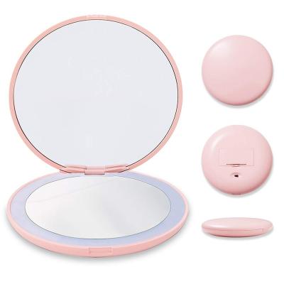 China Whole Sale 10x Magnifier Lighted Hand Makeup Round Led Hand Held Mirror With Light for sale