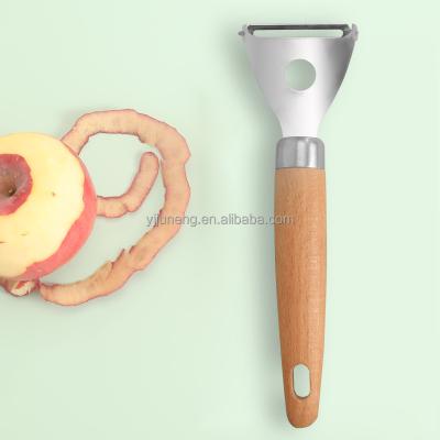 China Sustainable Kitchen Tools Wooden Handle Peeler Stainless Steel Peeler With Round Hole for sale