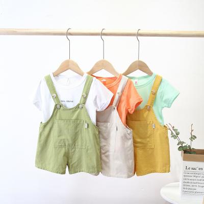 China 2021 new unisex children's summer children's bib shorts for boys and girls cute and popular cotton overall shorts for sale