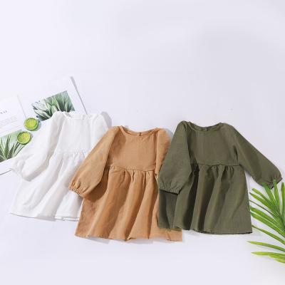 China New girls actions for color pure cotton and canvas long-sleeved a-line skirt in stock girls long-sleeved buttoned pleated canvas dress for sale