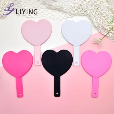 China Wholesale Custom Pocket Single Sided Mirror Heart Makeup Mirror Handheld Women Carry On Makeup Beauty Handle Dressing Mirror for sale