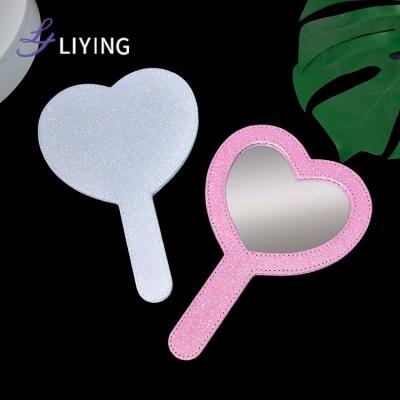 China Custom Portable Handheld Makeup Mirror Beauty Mirror Desktop Single-Sided Heart-Shaped Makeup Mirror Wholesale for sale