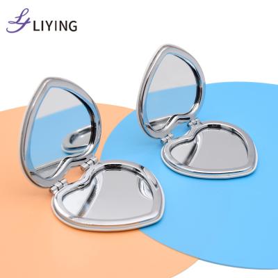 China Wholesale Magnifying Customized Folded Mirror Small Heart Makeup Mirror Custom Compact Logo for sale