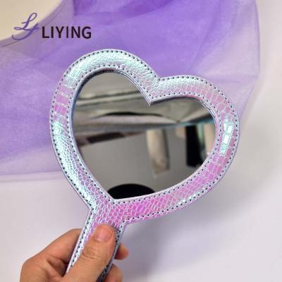 China Wholesale Custom Rose Hand Mirror Holographic Leather Cosmetic Mirror Heart Logo Custom Makeup Mirror Vendors for sale