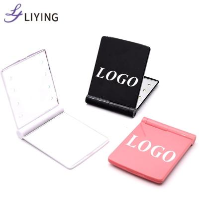 China Custom Pocket LED Cosmetic Mirror Makeup Mirror Portable LED Logo Lighted Handheld Mirror With Light for sale