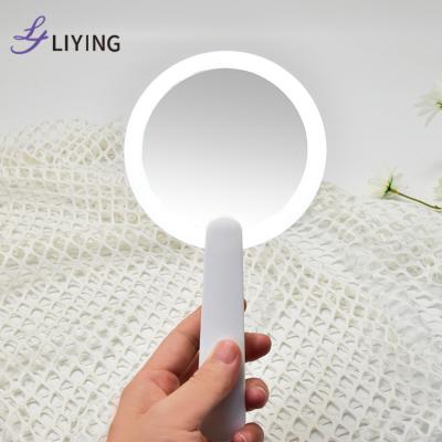 China Fashion Hand Mirror Pocket Makeup Mirror Folding Travel Lighted Handheld Cosmetic Portable Led Makeup Led Handheld Mirror for sale