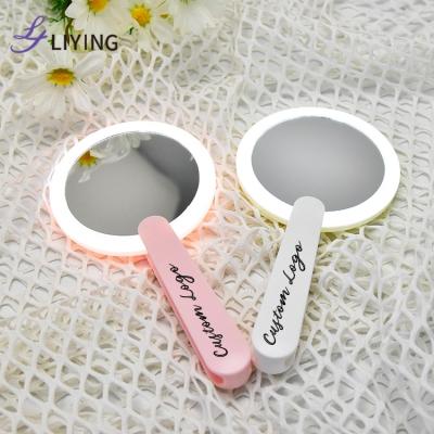 China New Design LED Lighted Mirror Hand Mirror Custom Logo Makeup Mirror Cosmetic for sale