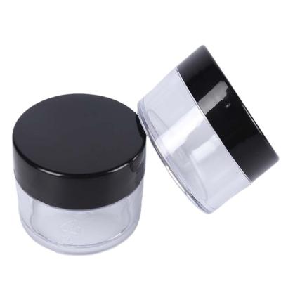 China Small And Cute Best Selling Empty Plastic Jar Container Cosmetic Jar With Black Lid for sale