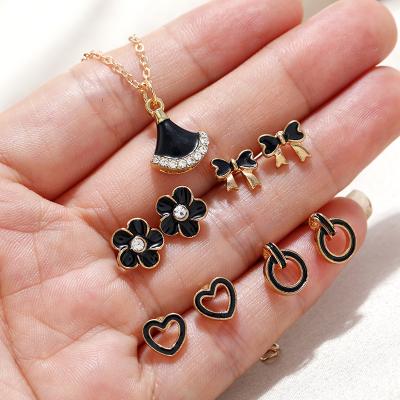 China 2021 New Design Women Trendy Sector Skirt Form Necklace And Earrings Black Zinc Alloy Set for sale