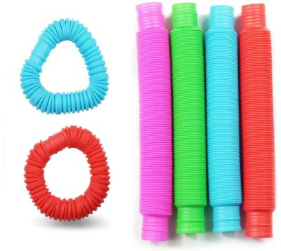 China Plastic Mini Pop Tube Toys, Sensory Stretch Pop Tube for Stress and Anxiety Relief, Pipe Sticky Person Sensory Toy Amazon Hot Selling for sale