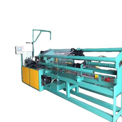 China Building Material Stores Double Wire Feeding Heavy Type Fully Automatic Fence Chain Link Machine for sale