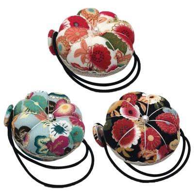 China Mat Sewing Pins Craft Supplies Pumpkin Ball Shaped Needle Pin Cushion Pincushion Wrist Strap Stitch Sewing Accessories DIY for sale